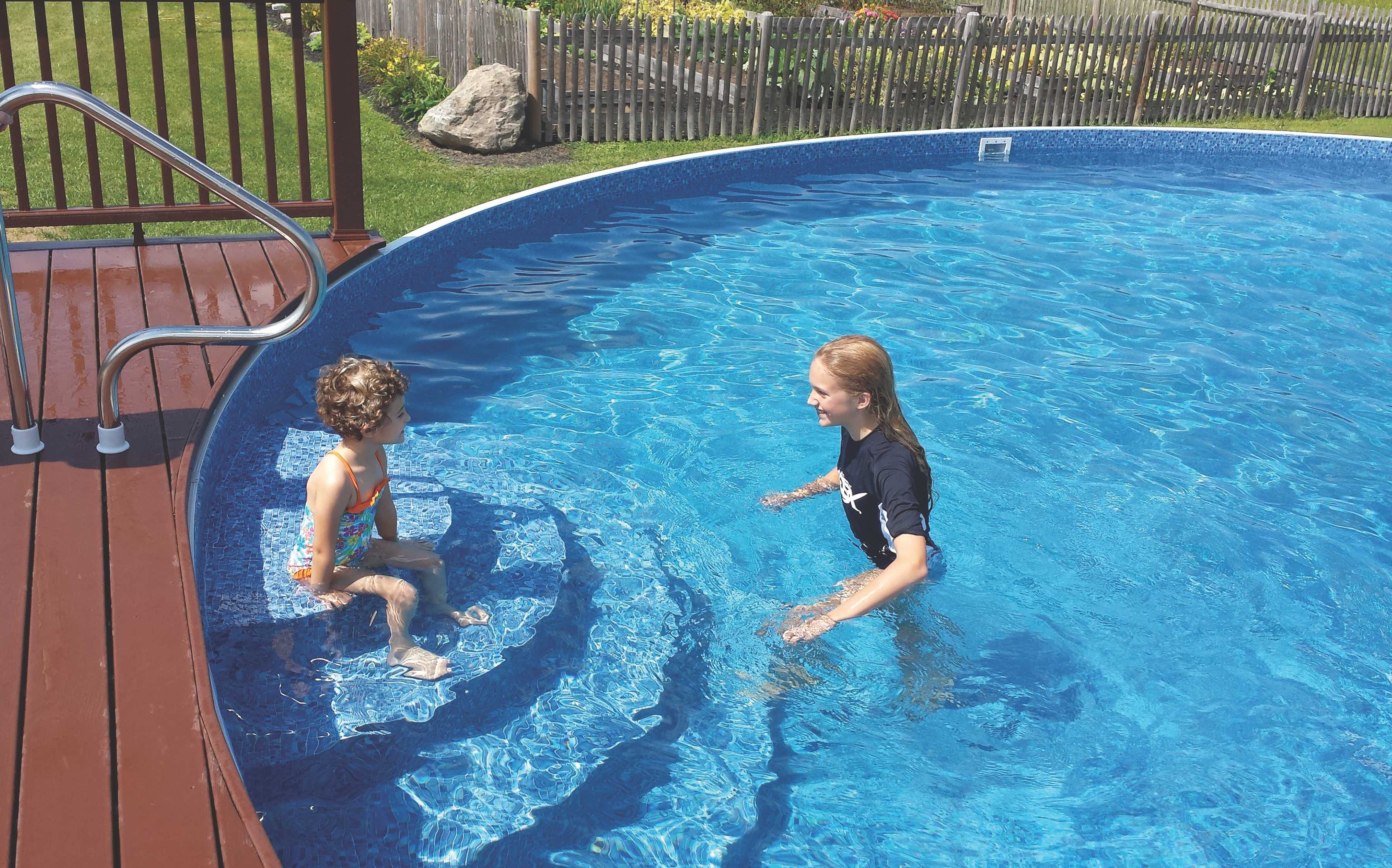 Kids stepping into a Metric pool with Wedding Cake steps