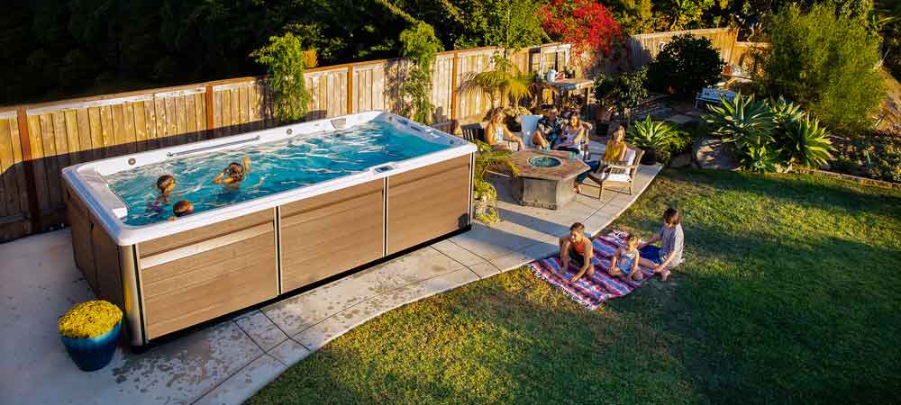 Endless Pools® R500 swim spa, backyard lawn