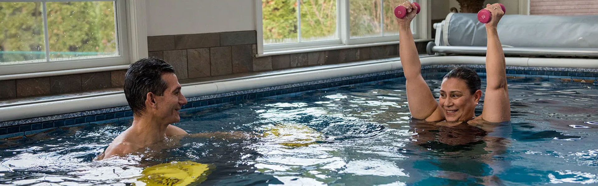 Couple exercising in an endless pool